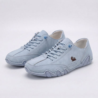 Low-top lace-up sneakers with round toes, stitched panels and segmented soles