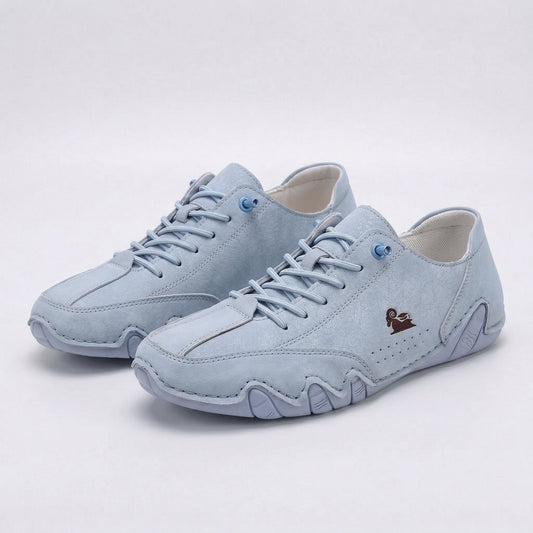 Low-top lace-up sneakers with round toes, stitched panels and segmented soles