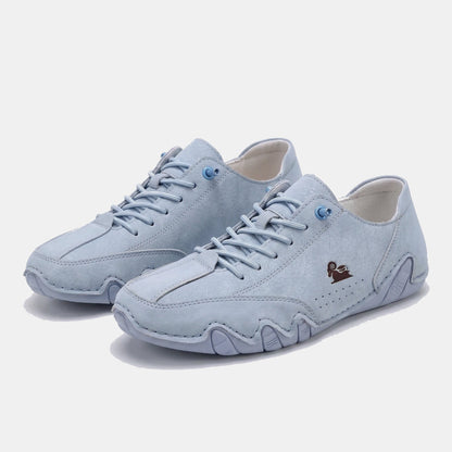 Low-top lace-up sneakers with round toes, stitched panels and segmented soles