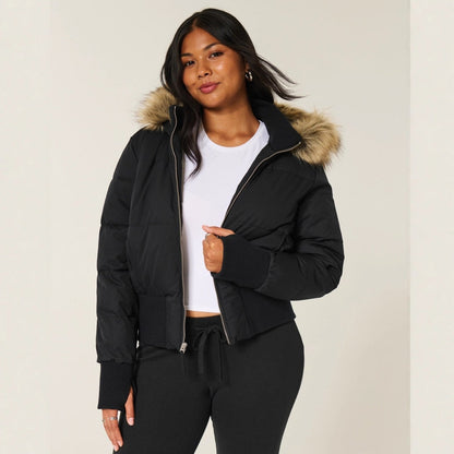 Women's cropped quilted jacket with hood and faux fur trim