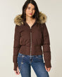 Women's cropped quilted jacket with hood and faux fur trim
