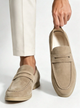Men's penny loafers with moc toe stitching, penny strap and low heel