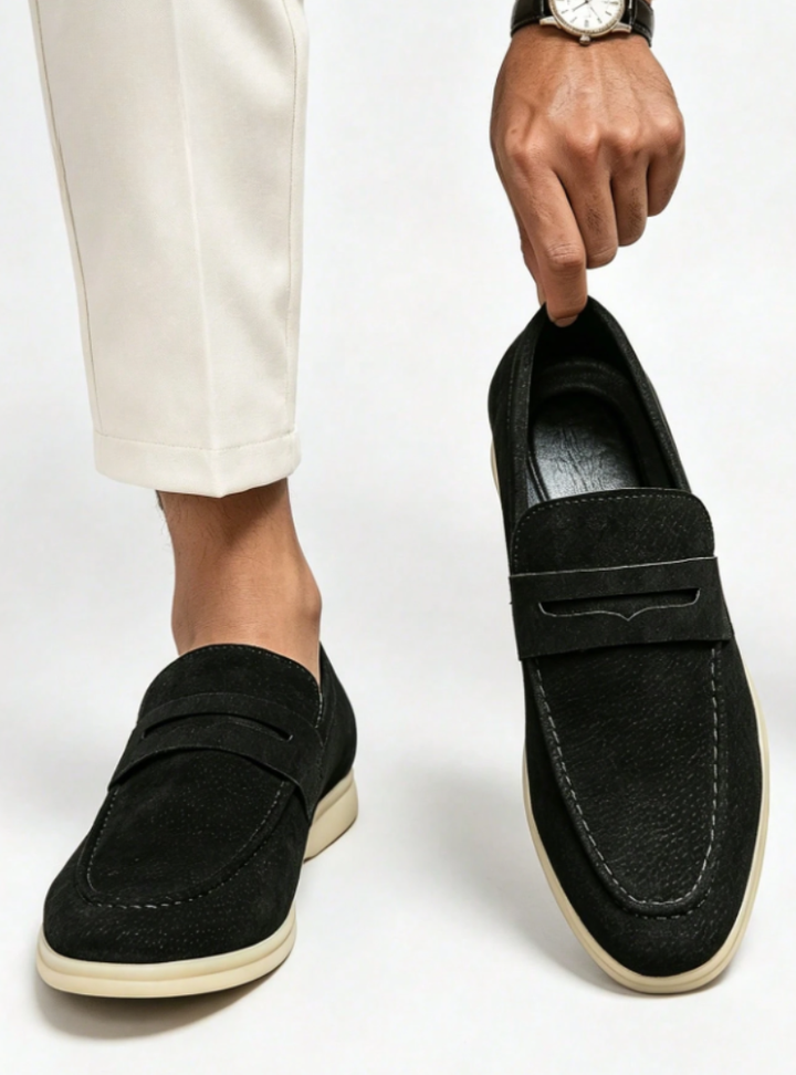 Men's penny loafers with moc toe stitching, penny strap and low heel