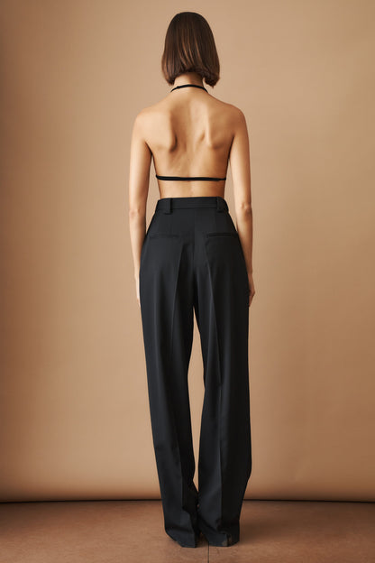 Women's black high-waisted wide-leg pleated pants with belt loops and side pockets