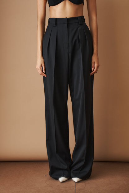 Women's black high-waisted wide-leg pleated pants with belt loops and side pockets
