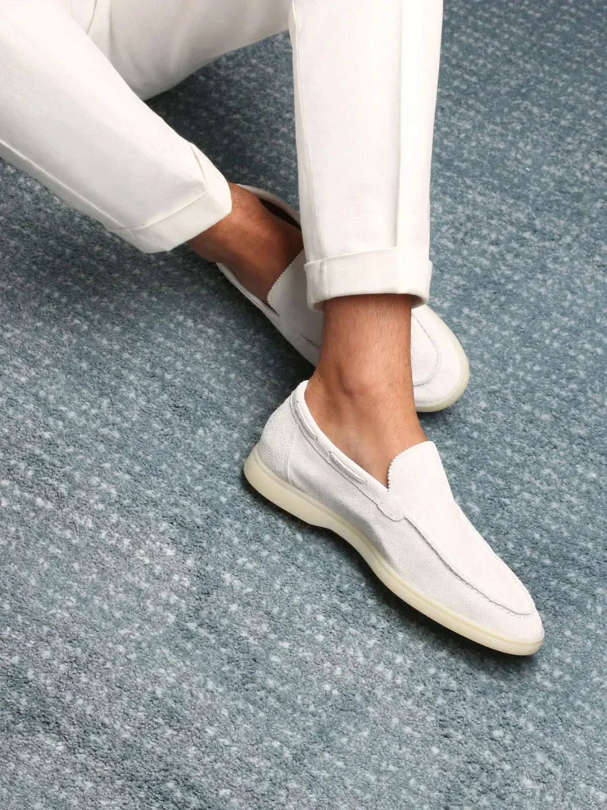 Men's white classic slip-on loafers with round toes and flat soles