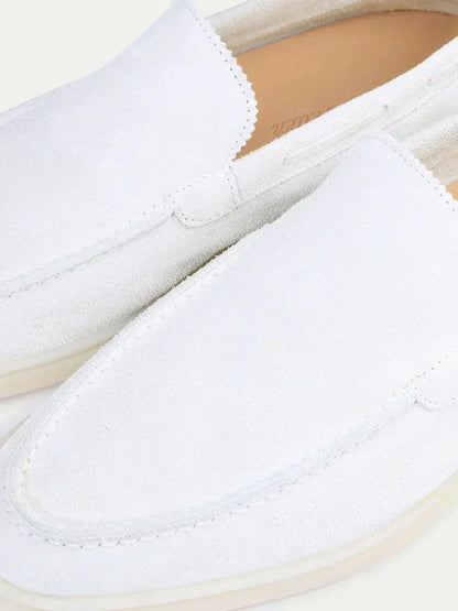 Men's white classic slip-on loafers with round toes and flat soles