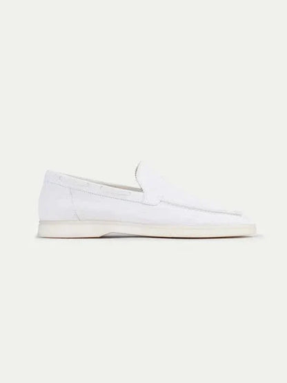 Men's white classic slip-on loafers with round toes and flat soles