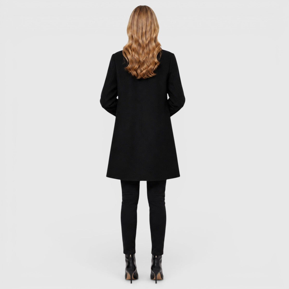 Women's long button front coat with notched collar and patch pockets