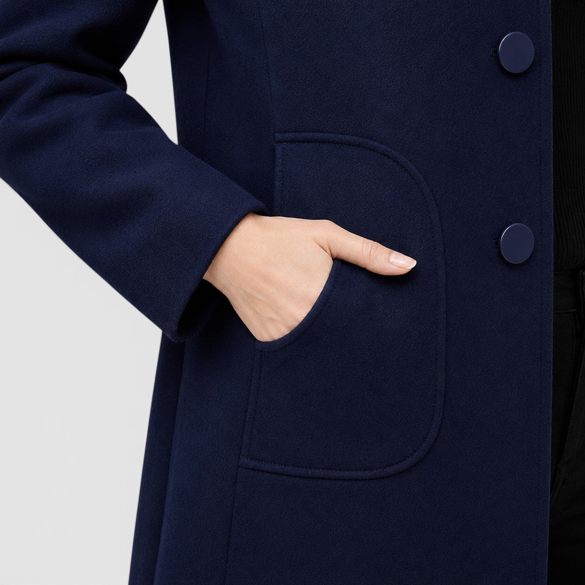Women's long button front coat with notched collar and patch pockets