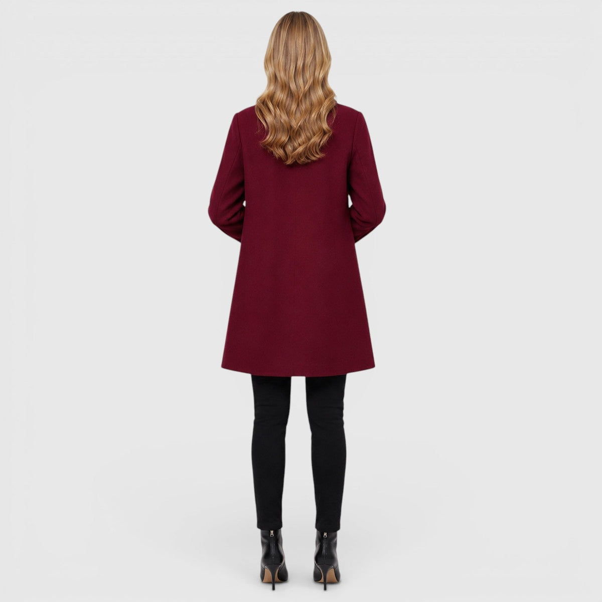 Women's long button front coat with notched collar and patch pockets
