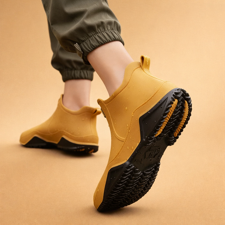 Women's waterproof pull-on ankle boots with lug soles