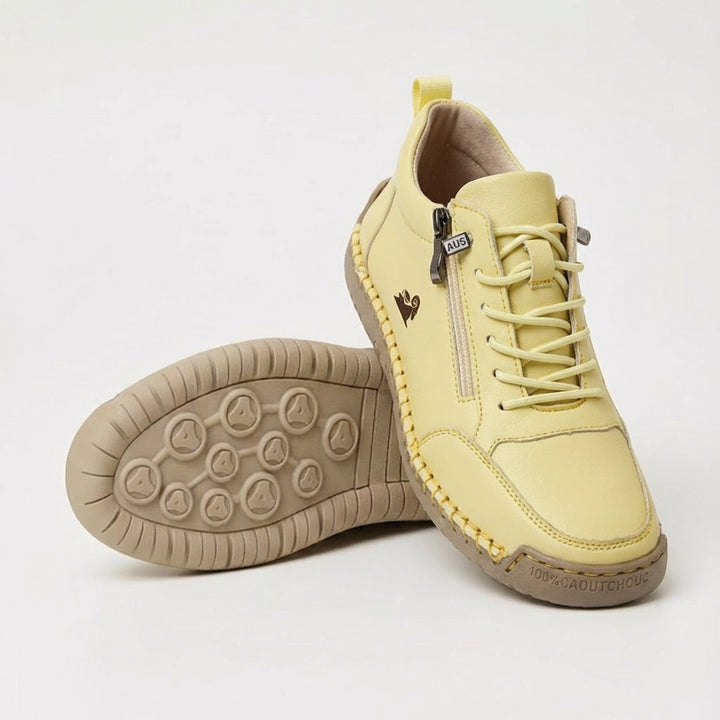 Women's lace-up sneakers with side zipper and flat textured sole