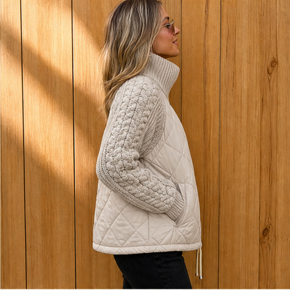 Women's quilted jacket with cable-knit sleeves and high collar
