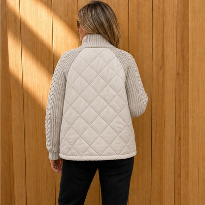 Women's quilted jacket with cable-knit sleeves and high collar