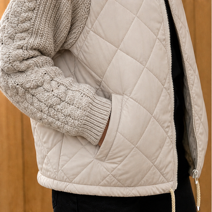 Women's quilted jacket with cable-knit sleeves and high collar
