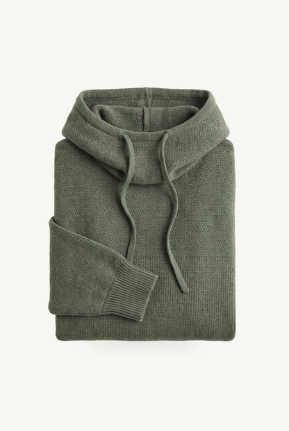 Women's textured knit hoodie with drawstring hood and long sleeves