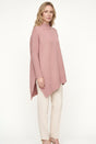 Women's oversized mock neck sweater with long sleeves and asymmetric hem