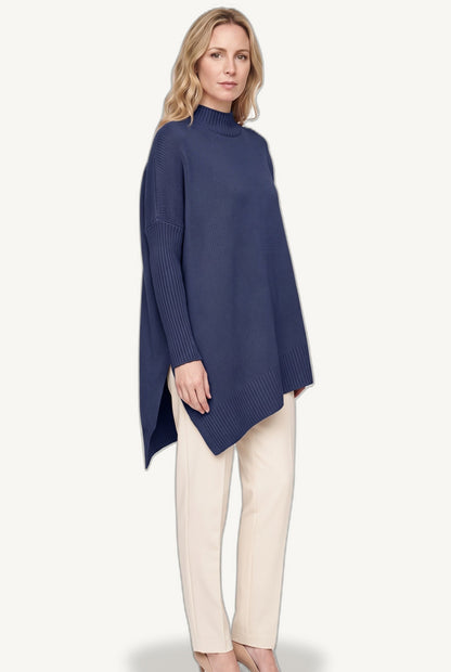 Women's oversized mock neck sweater with long sleeves and asymmetric hem