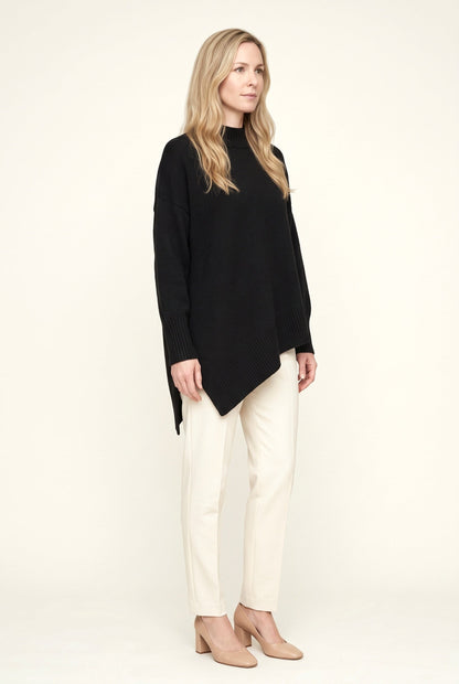 Women's oversized mock neck sweater with long sleeves and asymmetric hem