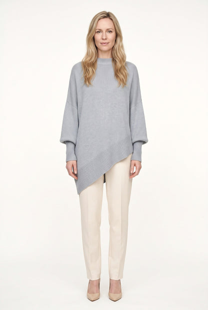Women's oversized mock neck sweater with long sleeves and asymmetric hem