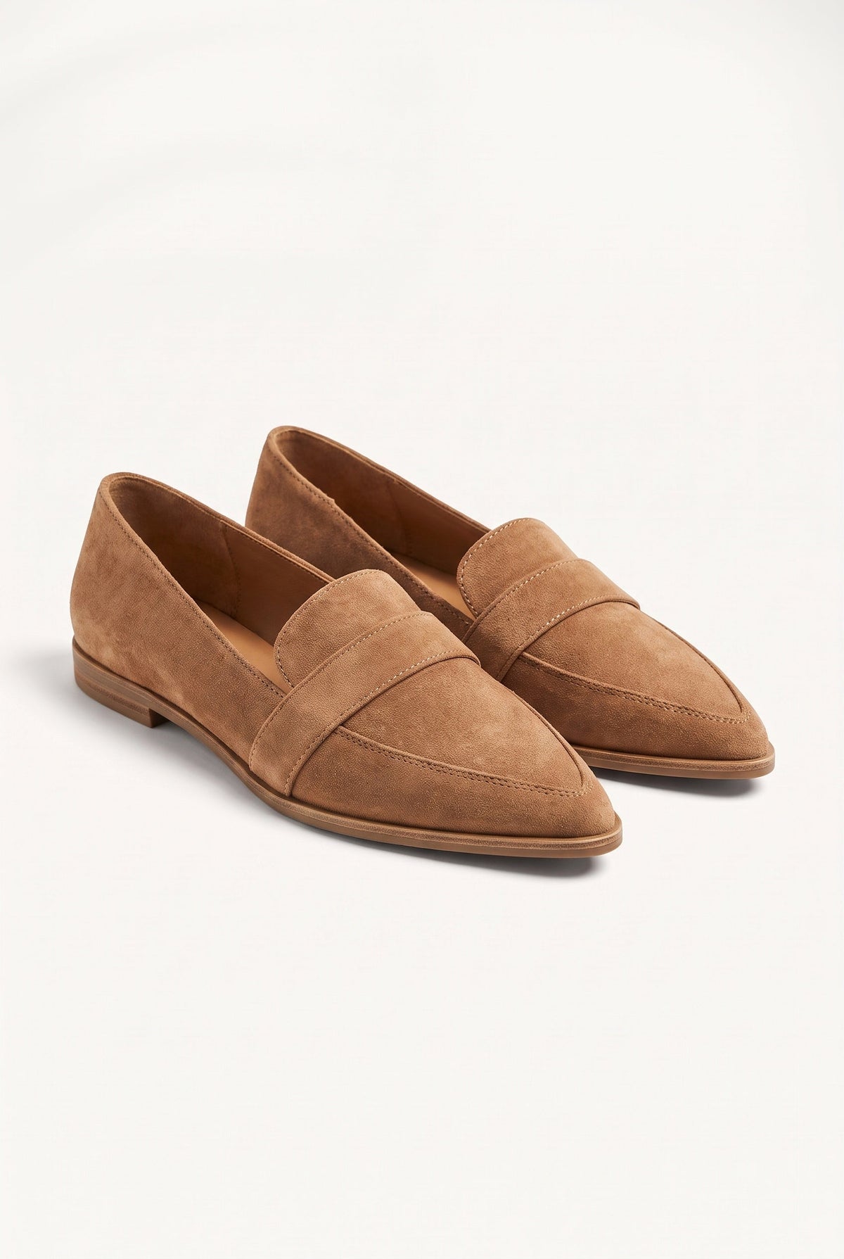 Women's slip-on penny strap loafers with pointed toes and low heels