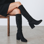 Women's black knee-high boots with almond toes, side zips and block heels