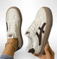 Low-top lace-up sneakers with contrasting side panels