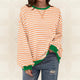 Women's striped pullover sweater with long sleeves and ribbed trims