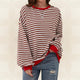 Women's striped pullover sweater with long sleeves and ribbed trims