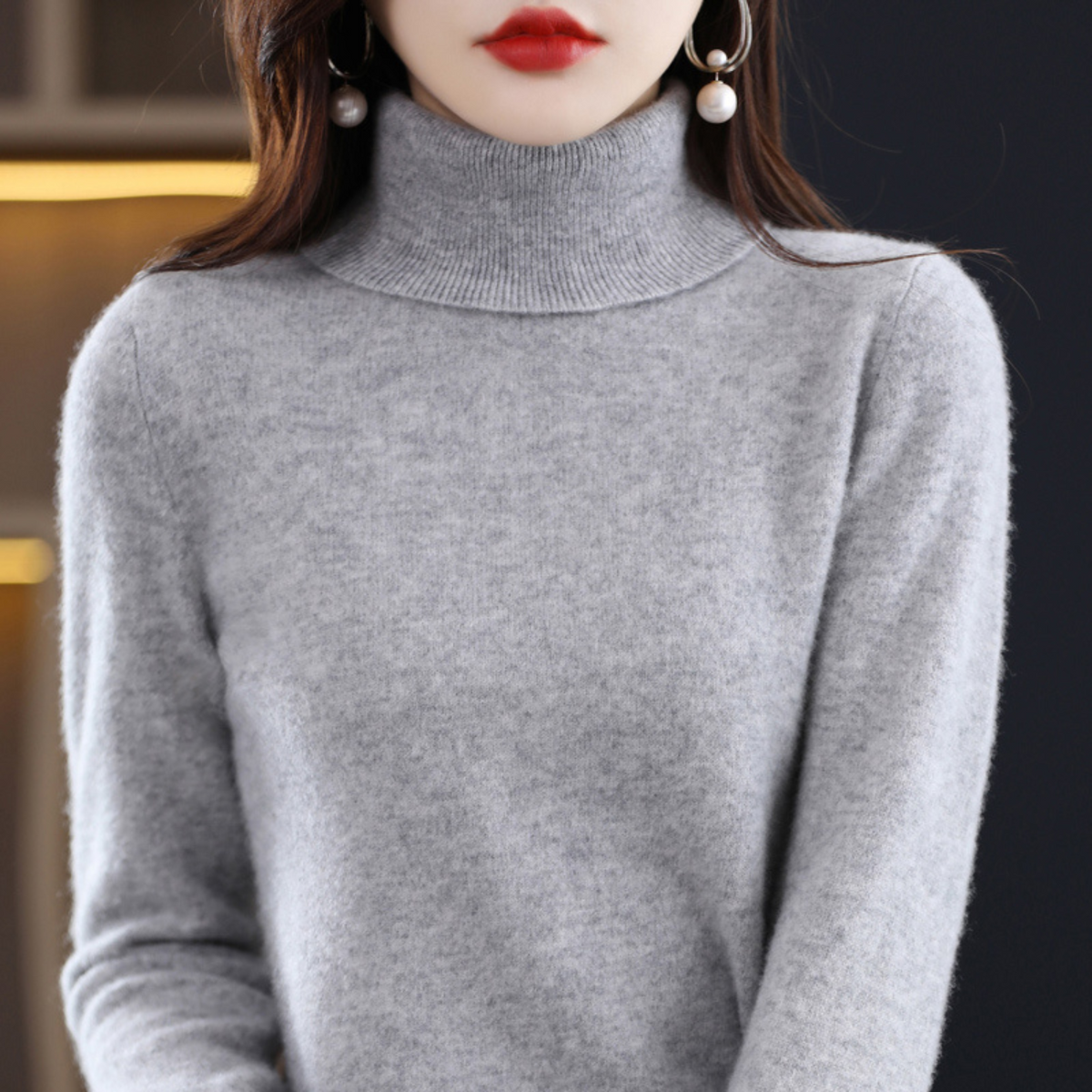 Women's long-sleeve turtleneck sweater with ribbed collar and cuffs
