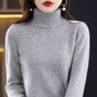 Women's long-sleeve turtleneck sweater with ribbed collar and cuffs