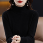 Women's long-sleeve turtleneck sweater with ribbed collar and cuffs