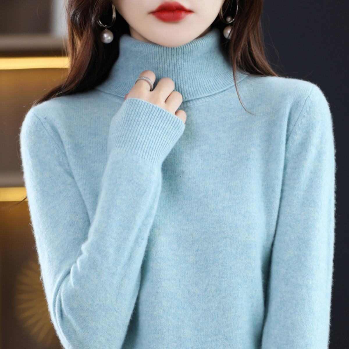 Women's long-sleeve turtleneck sweater with ribbed collar and cuffs