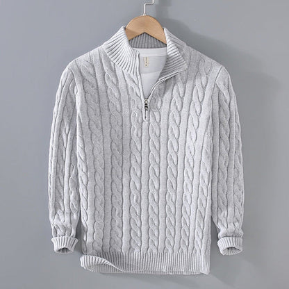 Unisex cable knit quarter-zip sweater with stand collar and ribbed trims