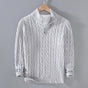 Unisex cable knit quarter-zip sweater with stand collar and ribbed trims