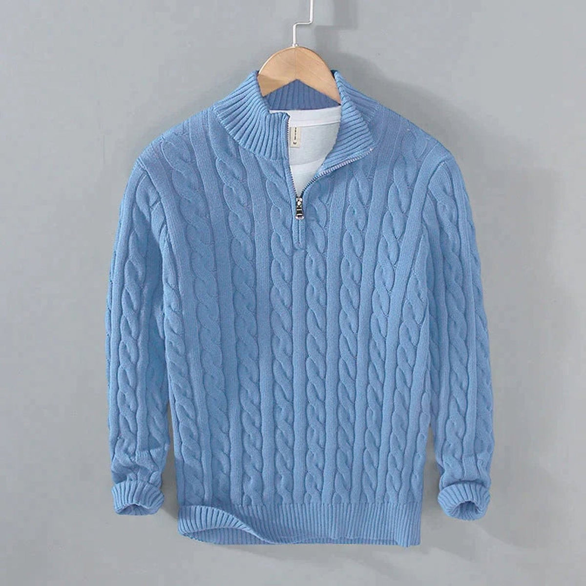 Unisex cable knit quarter-zip sweater with stand collar and ribbed trims
