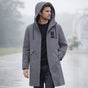Men's long hooded rain jacket with full-zip front and flap pockets