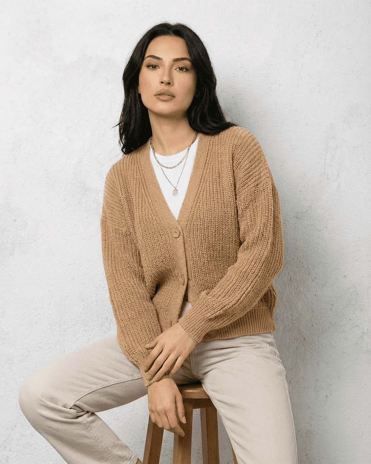 Women's beige textured V-neck cardigan with buttons and long sleeves