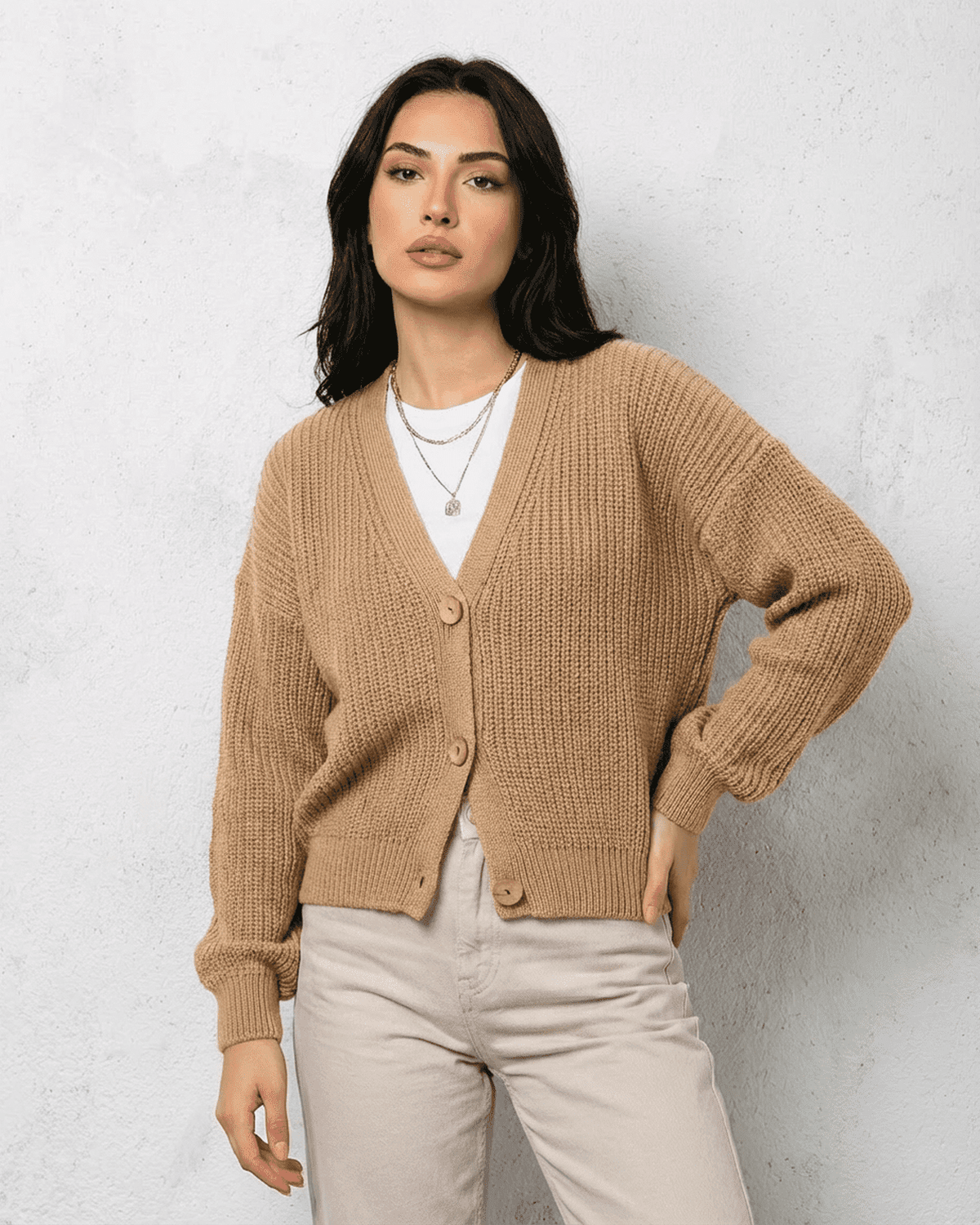 Women's beige textured V-neck cardigan with buttons and long sleeves