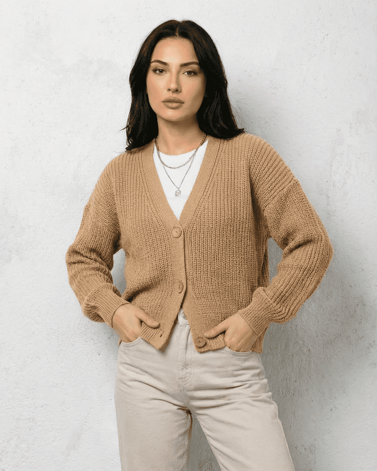 Women's beige textured V-neck cardigan with buttons and long sleeves