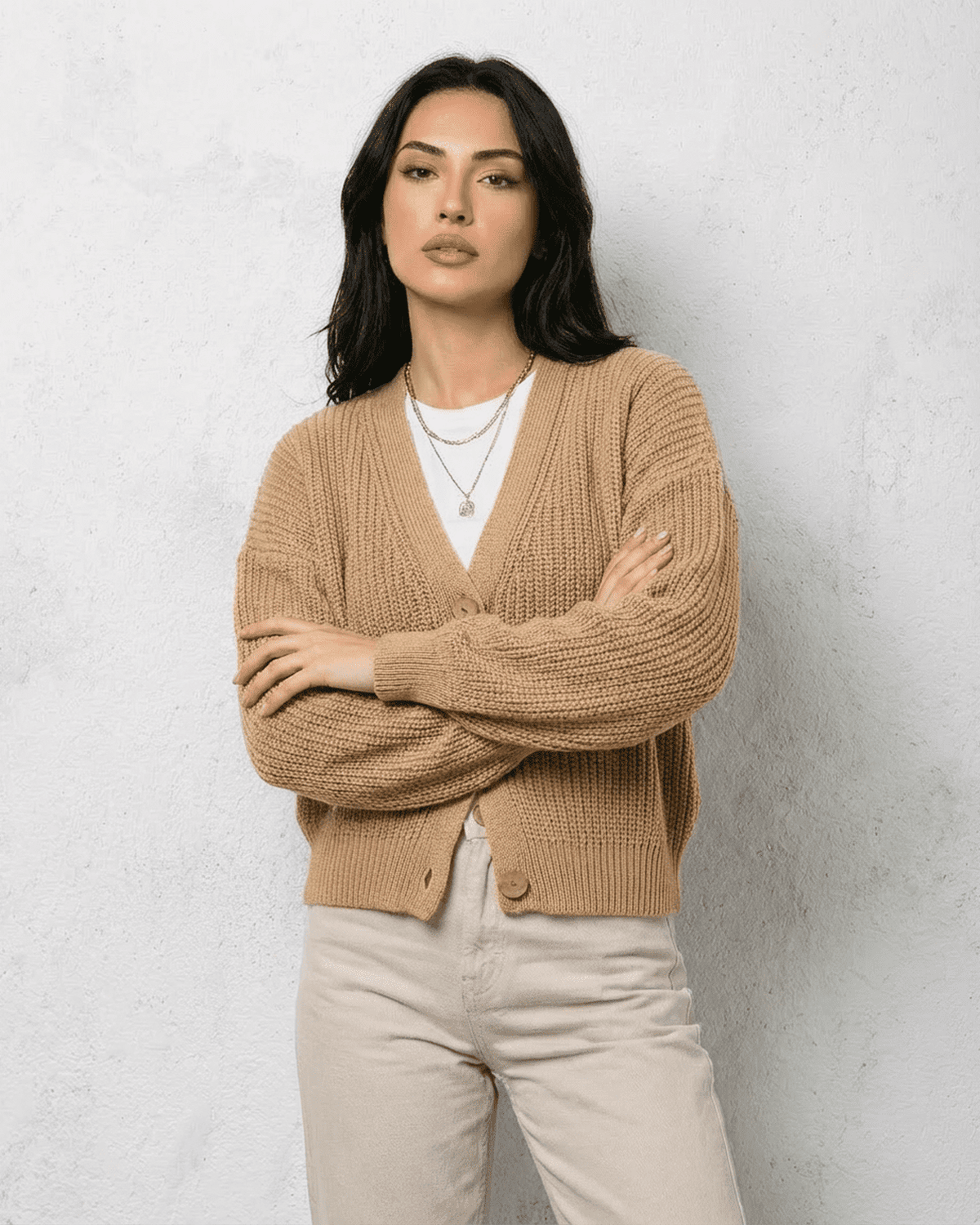 Women's beige textured V-neck cardigan with buttons and long sleeves