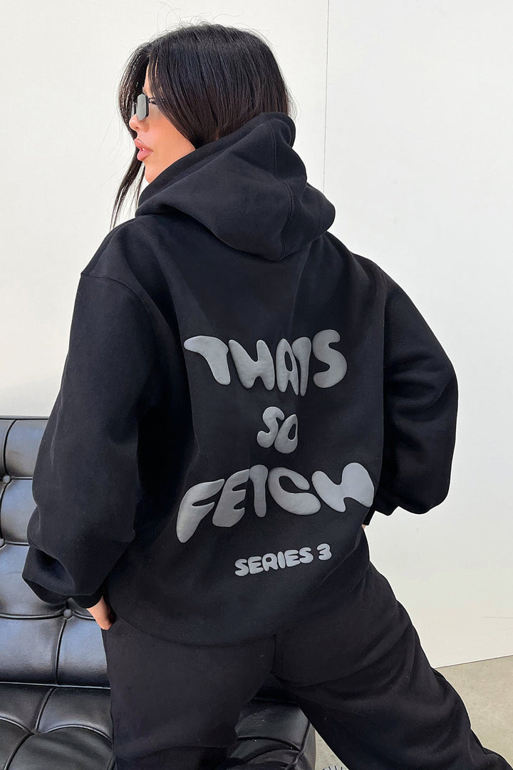Women's black cropped hoodie with hood, long sleeves and contrasting back graphic text