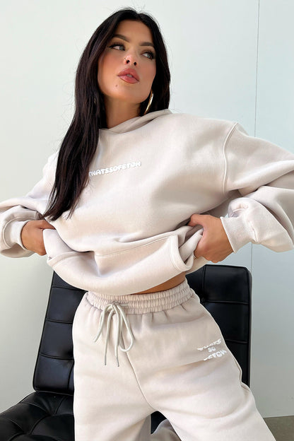 Women's beige oversized hoodie with hood, long sleeves and front kangaroo pocket