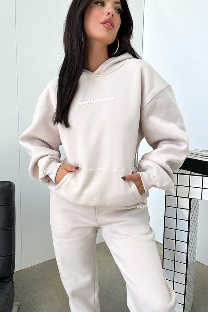 Women's beige oversized hoodie with hood, long sleeves and front kangaroo pocket