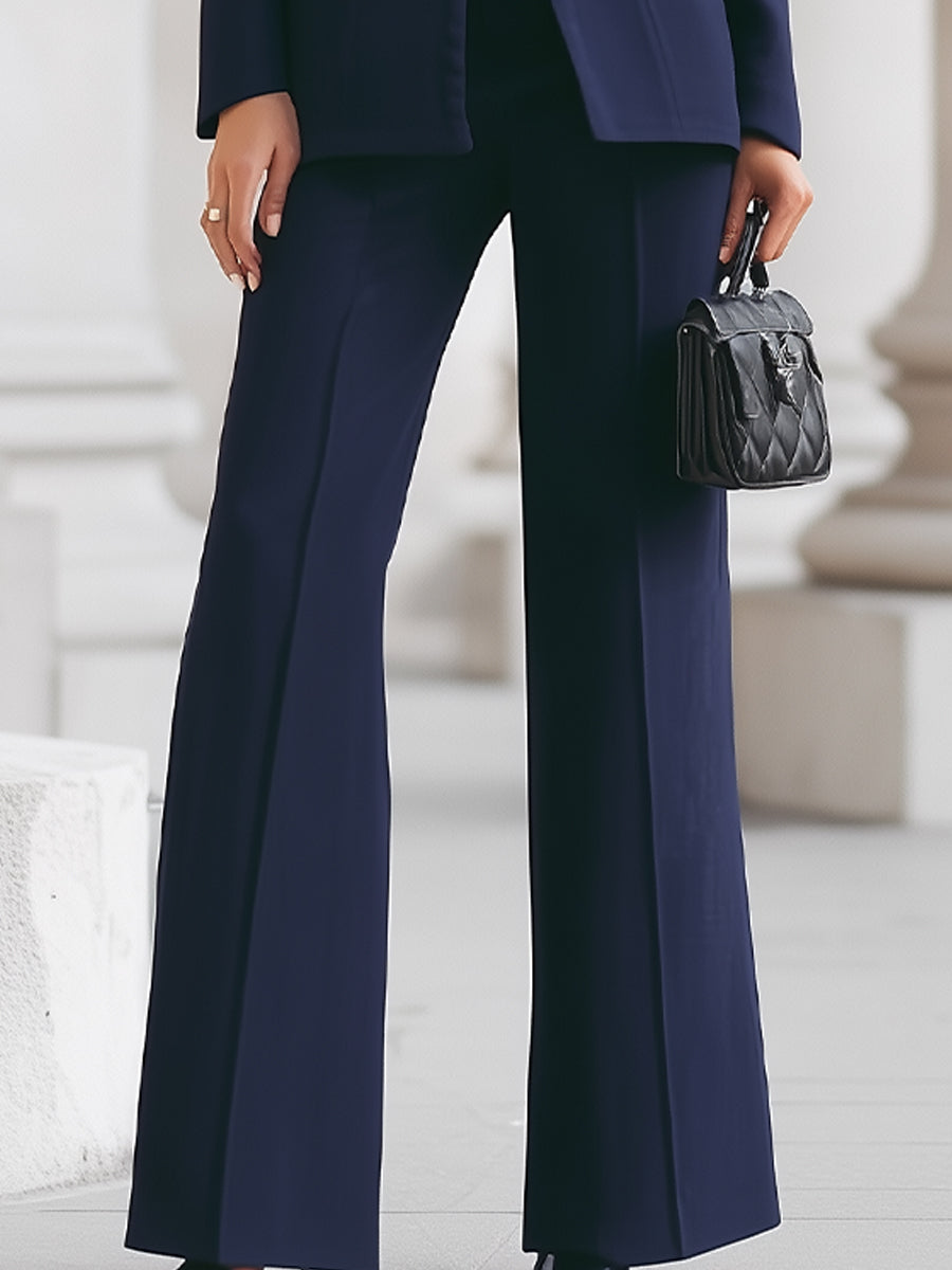 Women's tailored suit with high collar blazer and wide-leg trousers