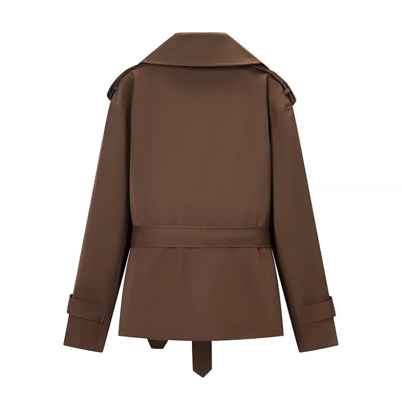 Women's brown cropped trench coat with wide lapels and tie belt