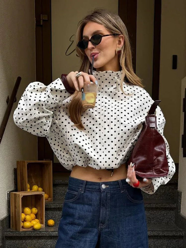 Women's polka dot cropped jacket with high neckline and long sleeves