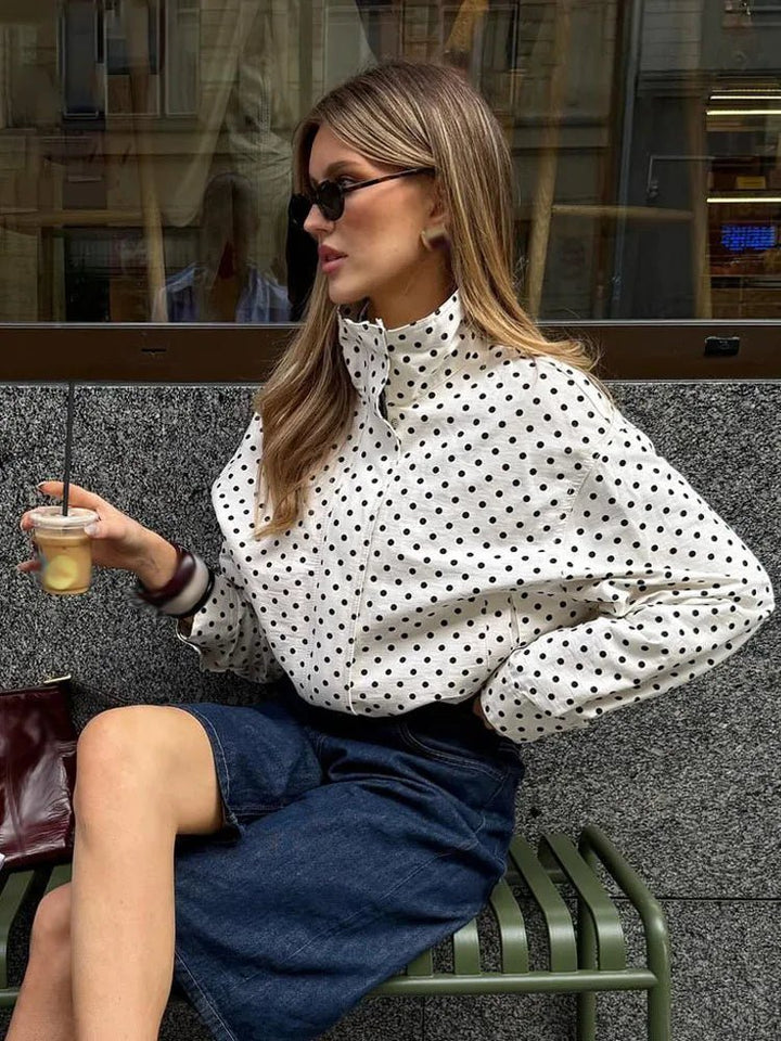 Women's polka dot cropped jacket with high neckline and long sleeves