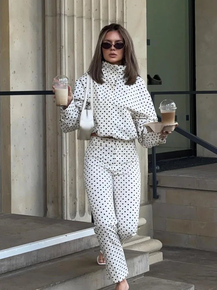 Women's polka dot cropped jacket with high neckline and long sleeves